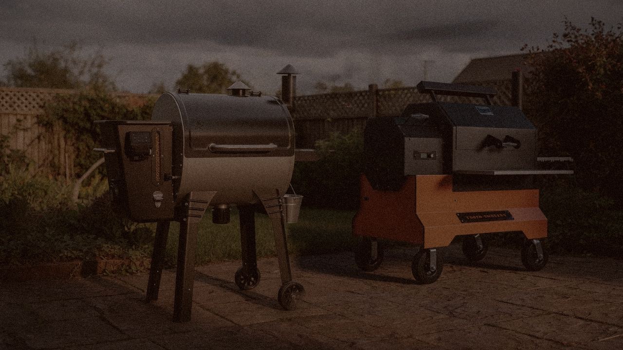 Camp Chef Woodwind Pro versus Yoder YS640s on a dusk patio