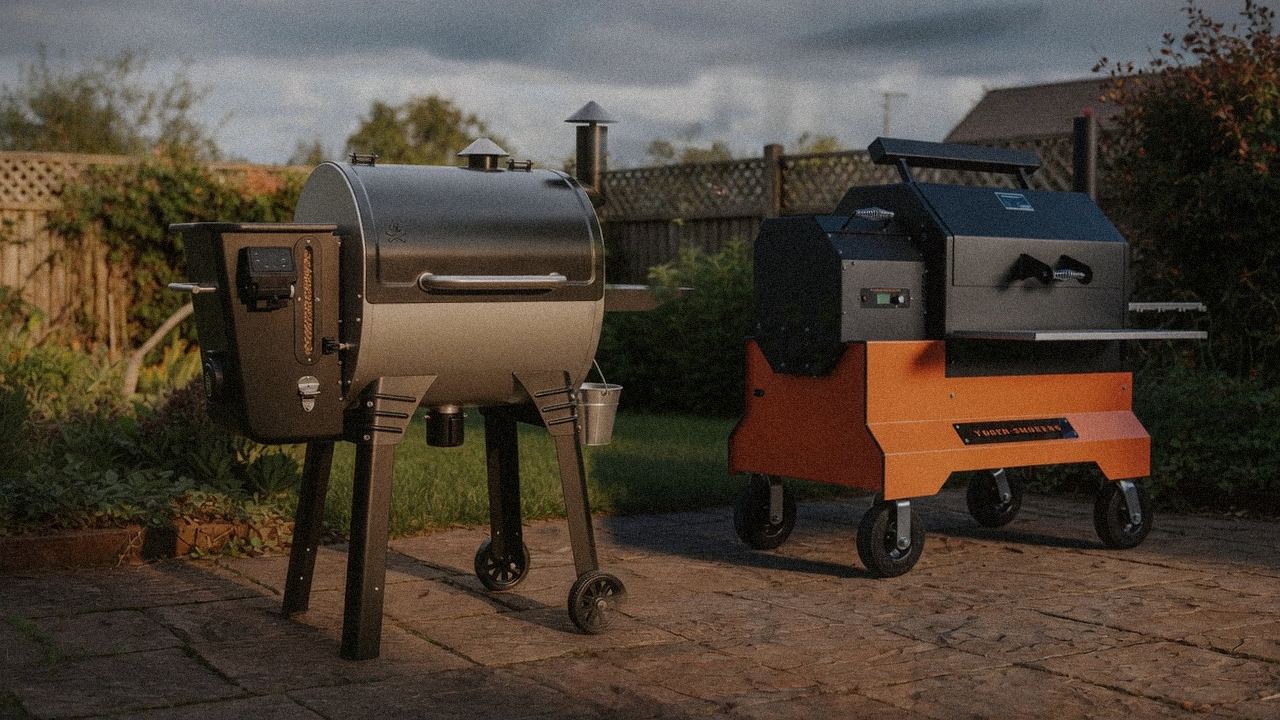 Camp Chef Woodwind Pro beside Yoder YS640s, official product photography on a dark steel panel
