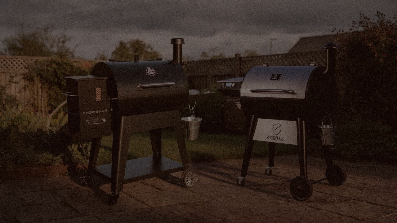 Pit Boss Sportsman and Z Grills 700 Series (ZPG-7002) at night with smoke, wood pellet grills on a dark patio