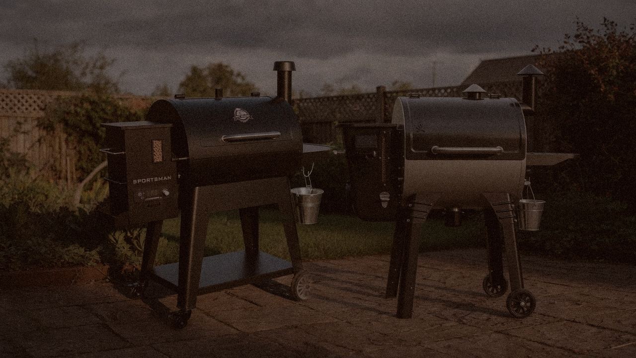 Pit Boss Sportsman beside Camp Chef Woodwind Pro, official product photography on a dark steel panel
