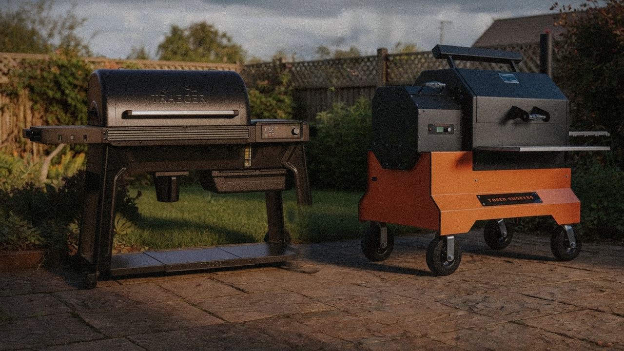 Traeger Ironwood standing next to Yoder Smokers YS640s, showing the size and price-tier gap