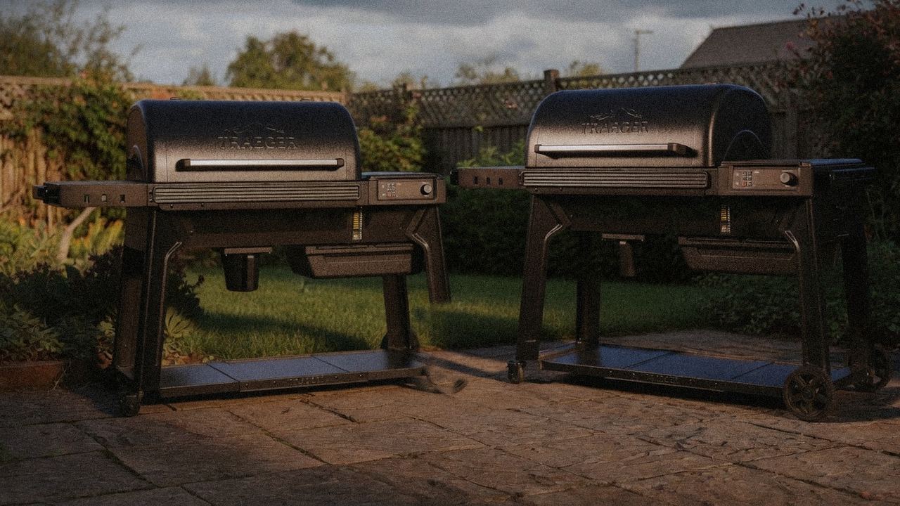 Traeger Timberline standing next to Traeger Woodridge Pro, showing the size and price-tier gap